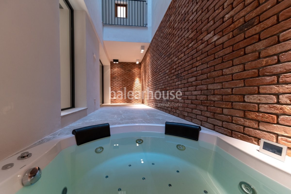 Diseño actual, confort y espacios llenos de luz en esta planta baja ubicada en el casco histórico.