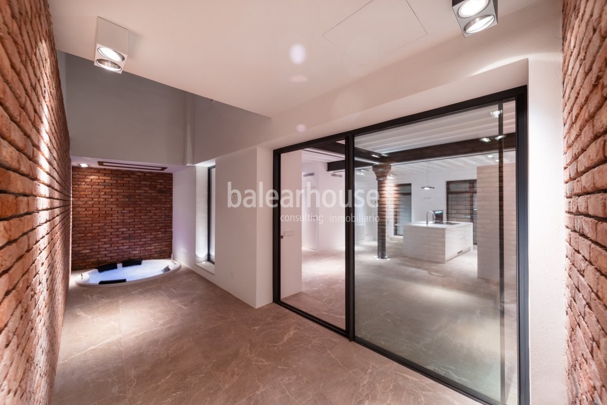 Diseño actual, confort y espacios llenos de luz en esta planta baja ubicada en el casco histórico.