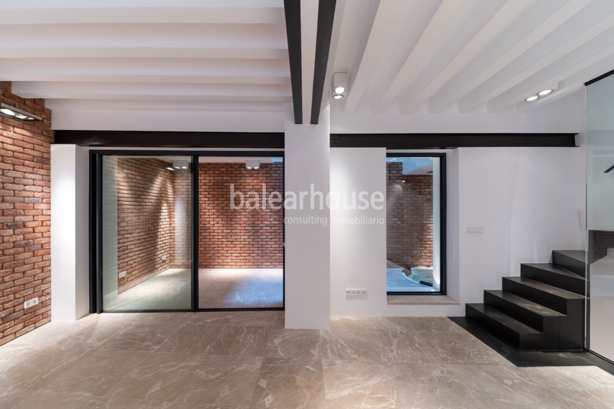 Diseño actual, confort y espacios llenos de luz en esta planta baja ubicada en el casco histórico.