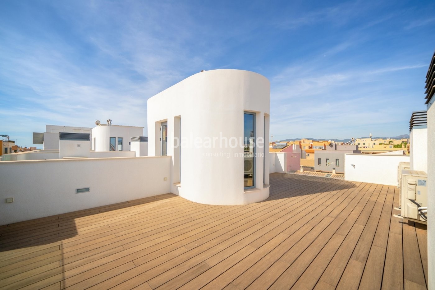 Modern new development of 4 three story houses with roof top terraces.