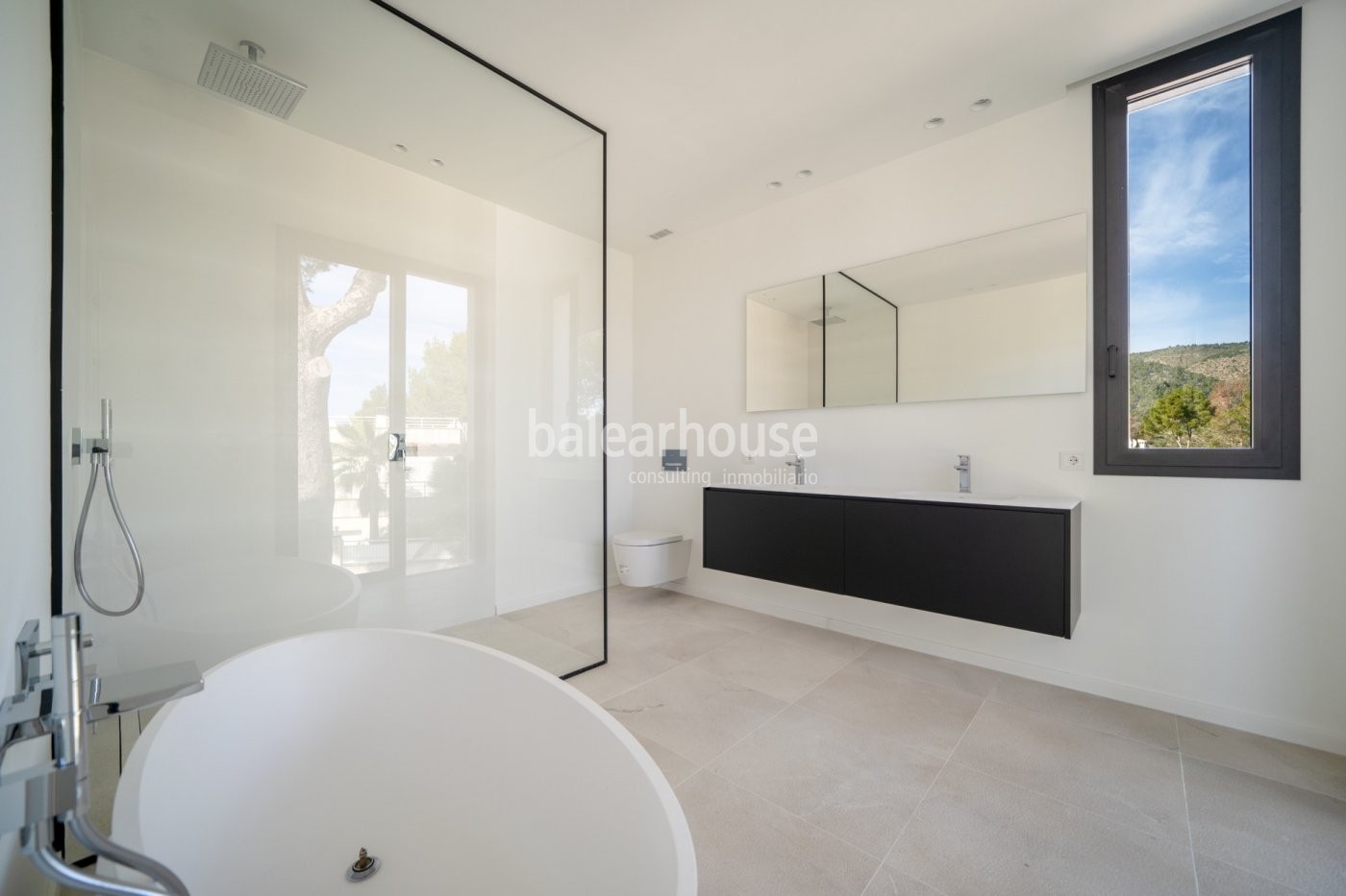Design and light-filled spaces in this newly built villa with sea views in Cas Catalá.