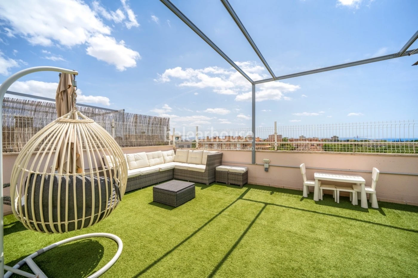 Modern penthouse with large private solarium and fantastic views that reach all the way to the sea.