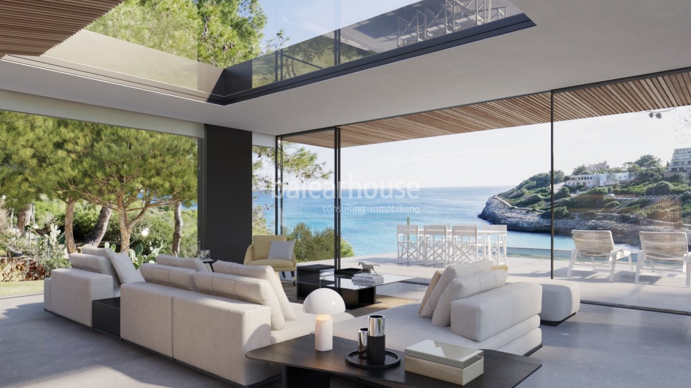 Innovative neu gebaute Villa direkt am Meer am idyllischen Strand von Cala Mandía