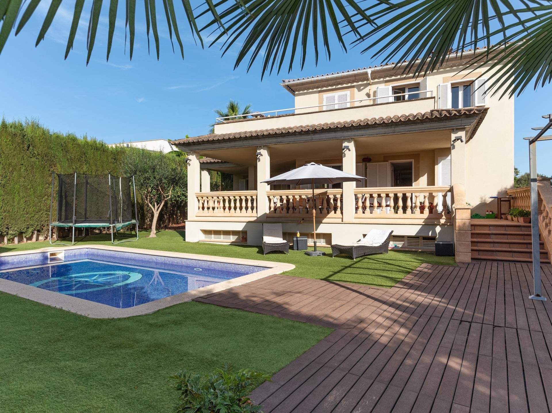 Excellent villa with sunny terraces and private pool situated in a green area close to Son Vida.