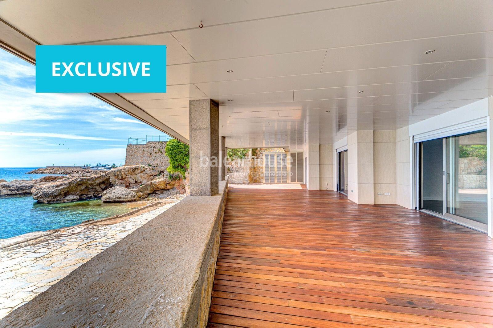Exclusive seafront property with large terrace and direct private access to the sea.