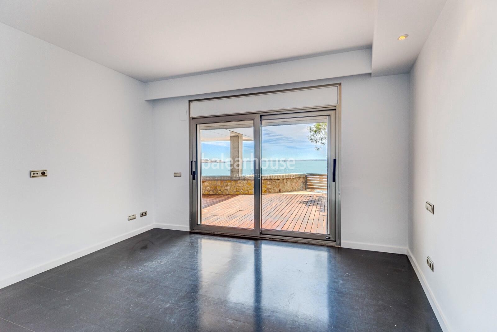 Exclusive seafront property with large terrace and direct private access to the sea.