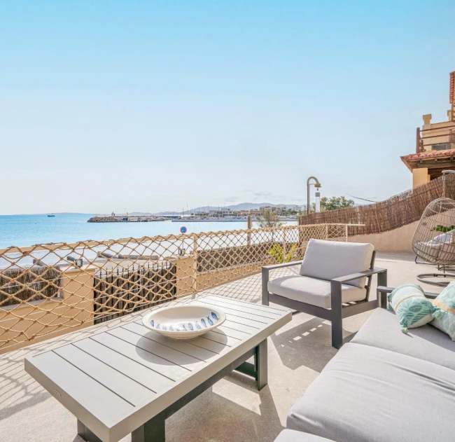 Fabulous Moderna beachfront villa with terraces large garden and swimming pool on the Costa de Palma