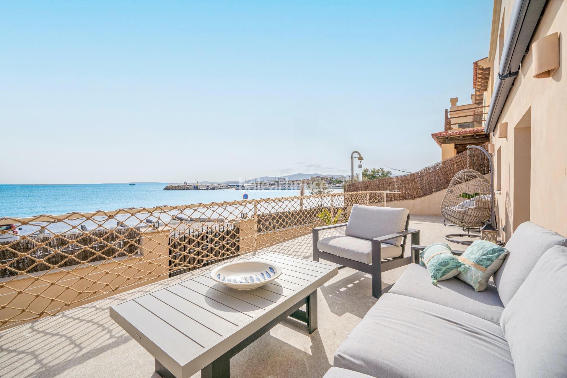 Fabulous Moderna beachfront villa with terraces large garden and swimming pool on the Costa de Palma