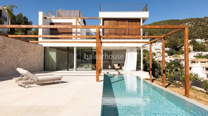 Spectacular new designer villa with high qualities and fantastic views of the hills of Palma.