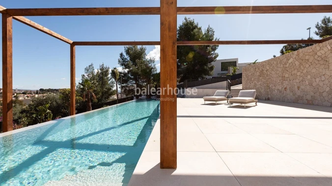 Spectacular new designer villa with high qualities and fantastic views of the hills of Palma.