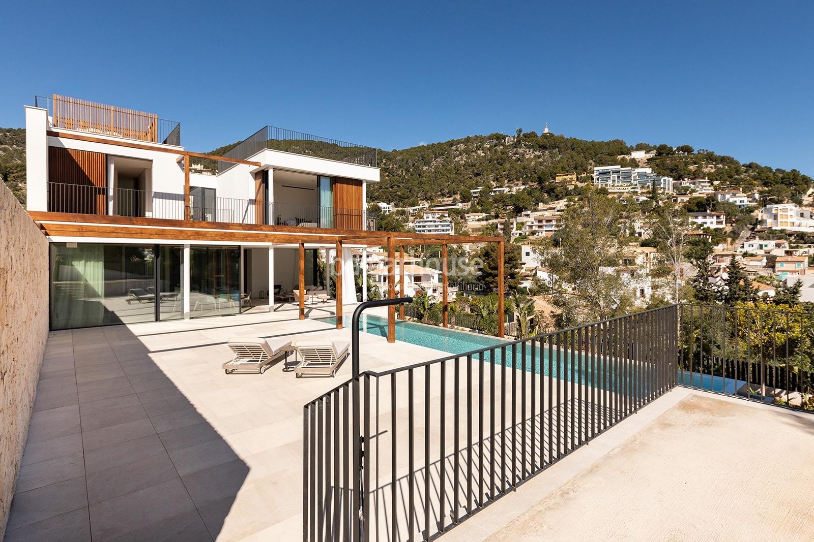 Espectacular villa nueva de diseño con altas calidades y fantásticas vistas a las colinas de Palma.