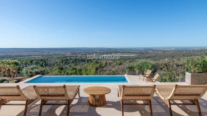Modern newly built rustic finca with large exteriors and spectacular views of Palma and the sea.