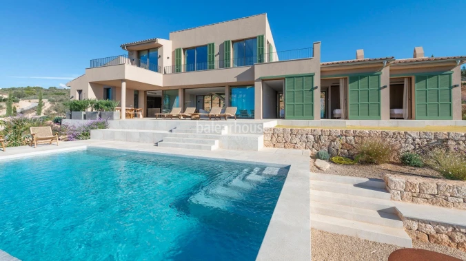 Modern newly built rustic finca with large exteriors and spectacular views of Palma and the sea.