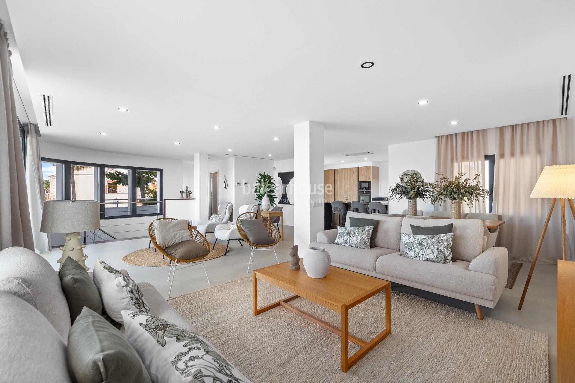 Moderna south facing villa with swimming pools and sea views next to the beach in Badía Blava