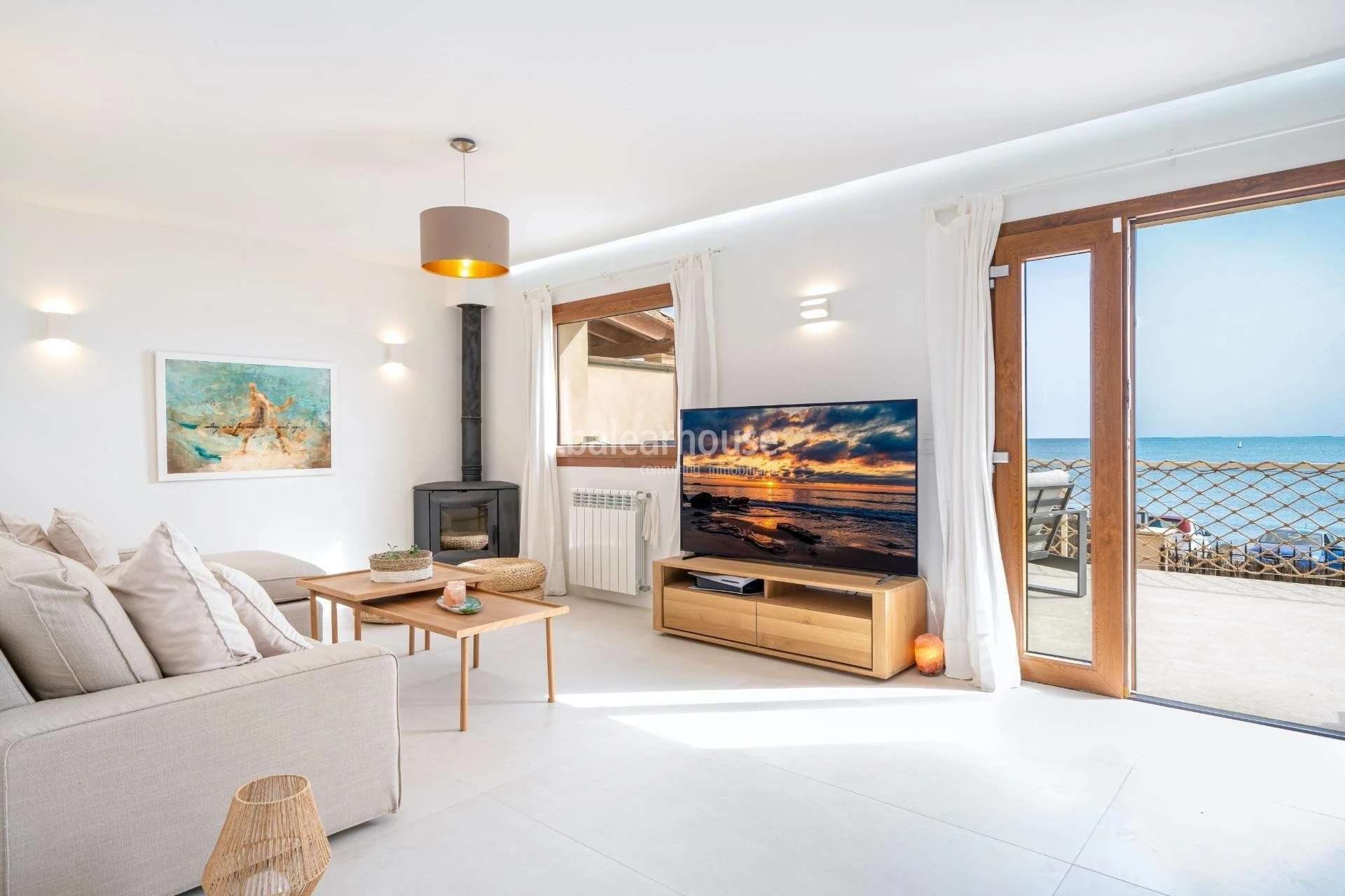 Fabulous Moderna beachfront villa with terraces large garden and swimming pool on the Costa de Palma