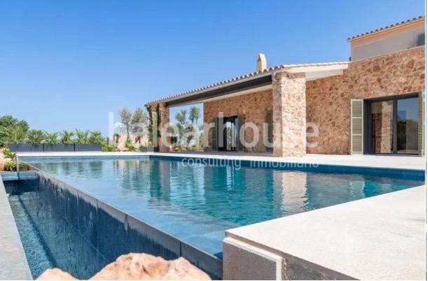Excelente finca nueva de diseño rústico y moderno con gran terreno y zona arbolada en Llucmajor