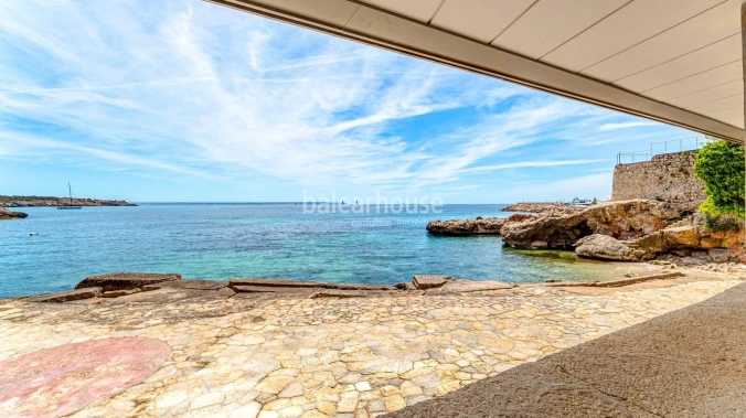 Exclusive seafront property with large terrace and direct private access to the sea.