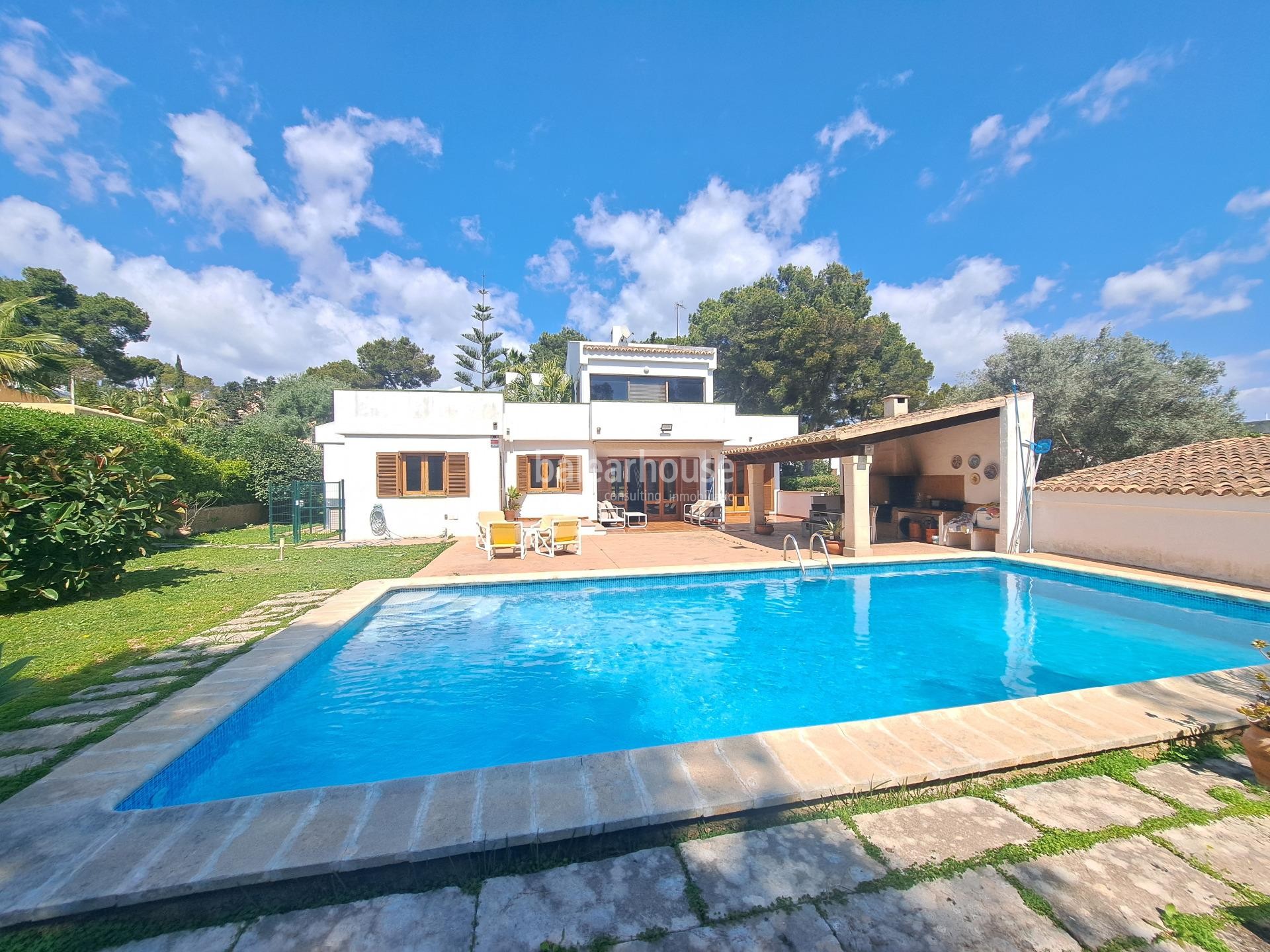 Mediterranean villa with expansive outdoor areas and lush woodland just steps from the Santa Ponsa Yacht Club