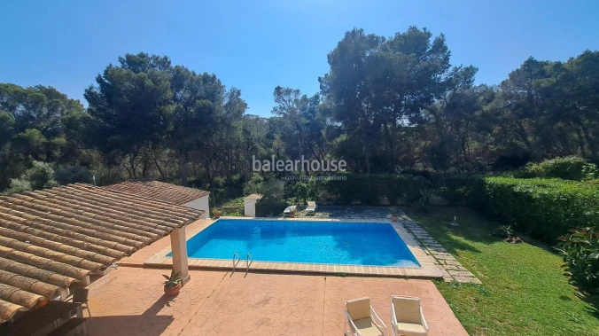 Mediterranean villa with expansive outdoor areas and lush woodland just steps from the Santa Ponsa Yacht Club
