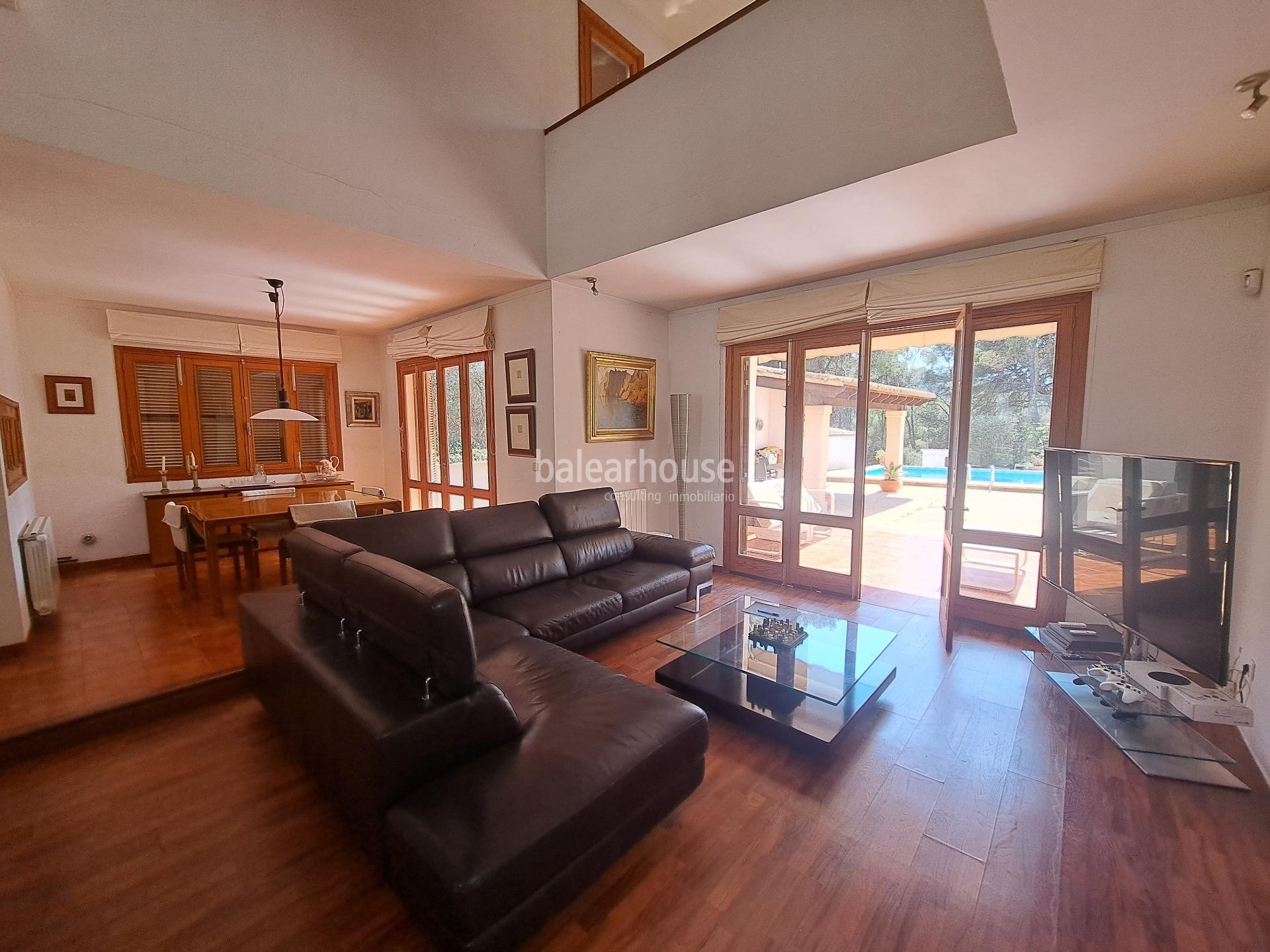 Mediterranean villa with expansive outdoor areas and lush woodland just steps from the Santa Ponsa Yacht Club