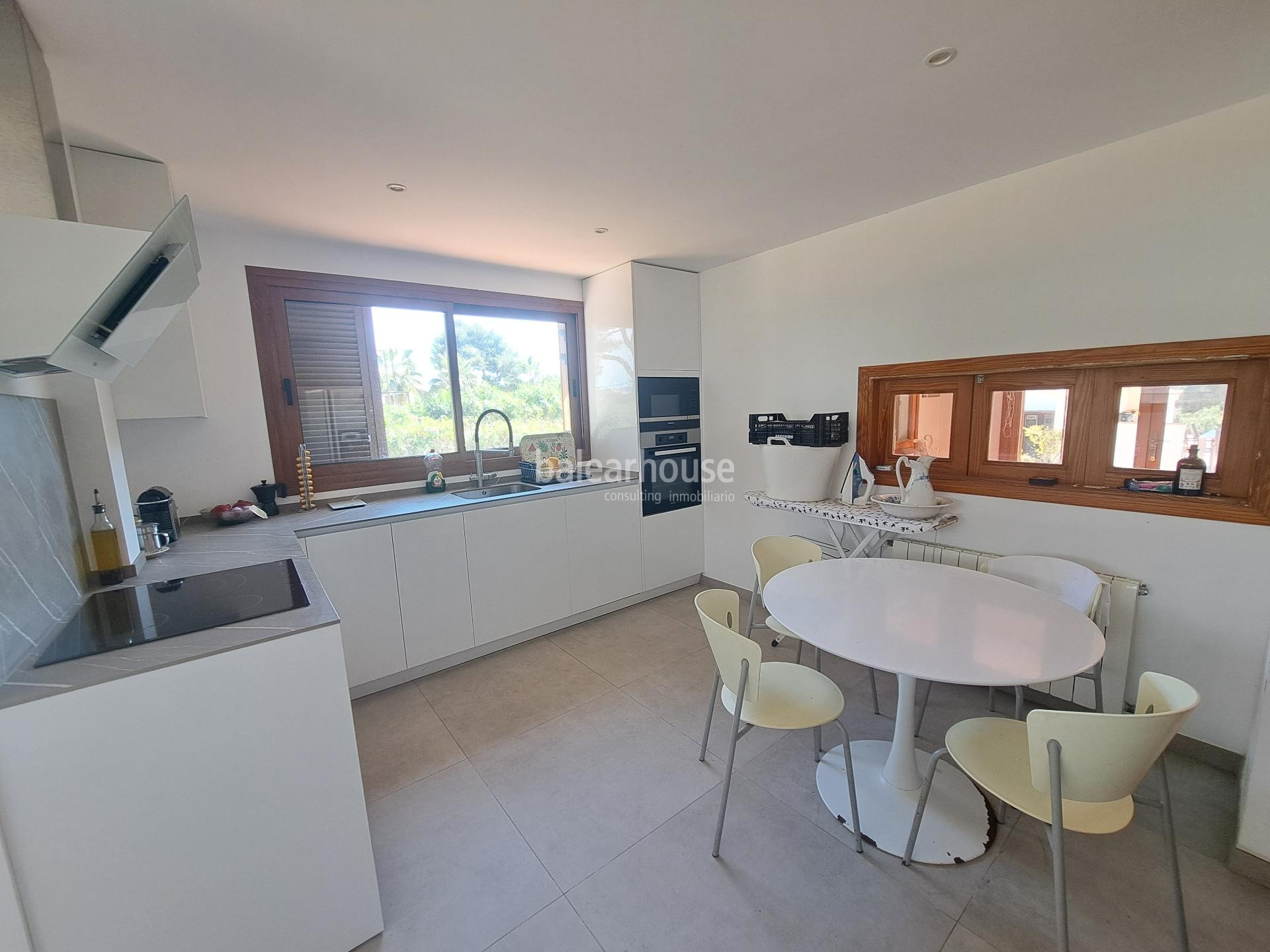 Mediterranean villa with expansive outdoor areas and lush woodland just steps from the Santa Ponsa Yacht Club