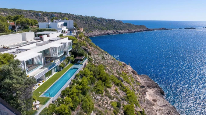 Contemporary architecture on the frontline of Port Adriano with panoramic sea views