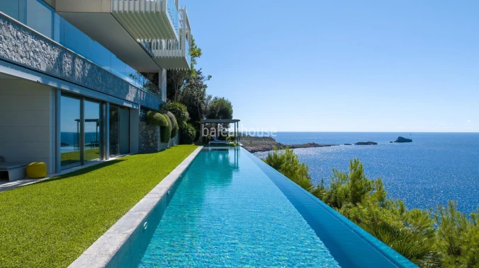 Contemporary architecture on the frontline of Port Adriano with panoramic sea views