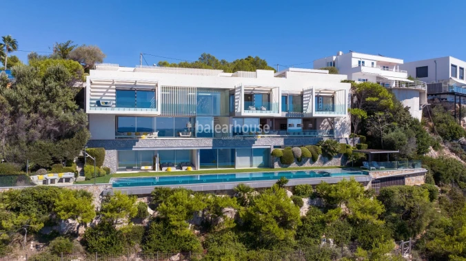 Contemporary architecture on the frontline of Port Adriano with panoramic sea views