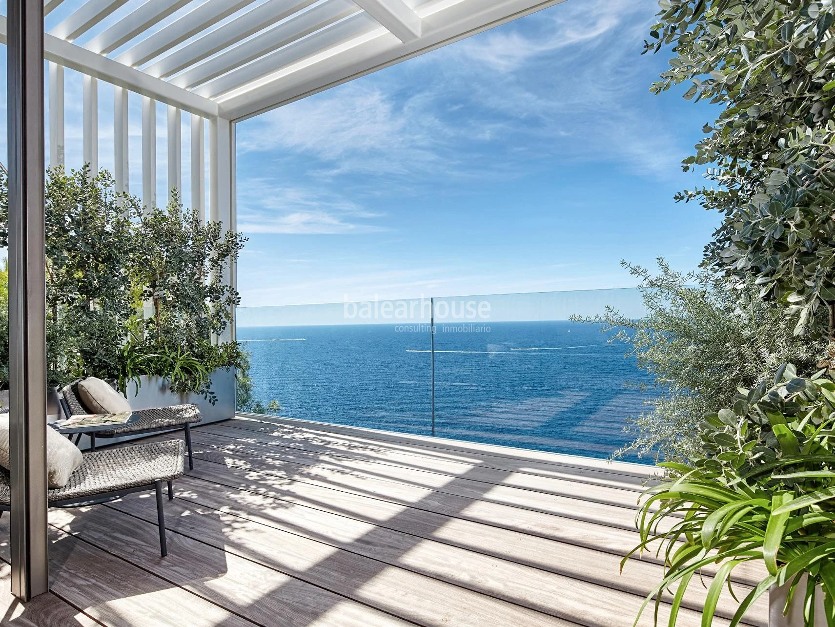 Contemporary architecture on the frontline of Port Adriano with panoramic sea views