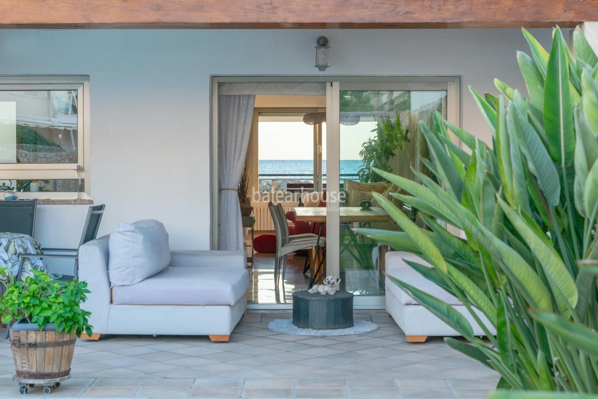 Magnífica casa frente al Mediterráneo con jardín, terraza y altas calidades en el privilegiado paseo del Portixol-Molinar
